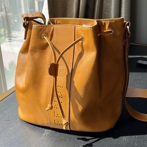 Fendi bucket tan bag.